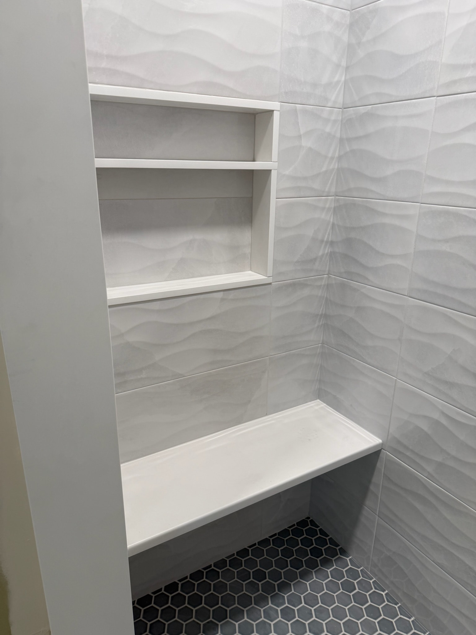 Custom tile shower installation by Quality Tile Installation LLC