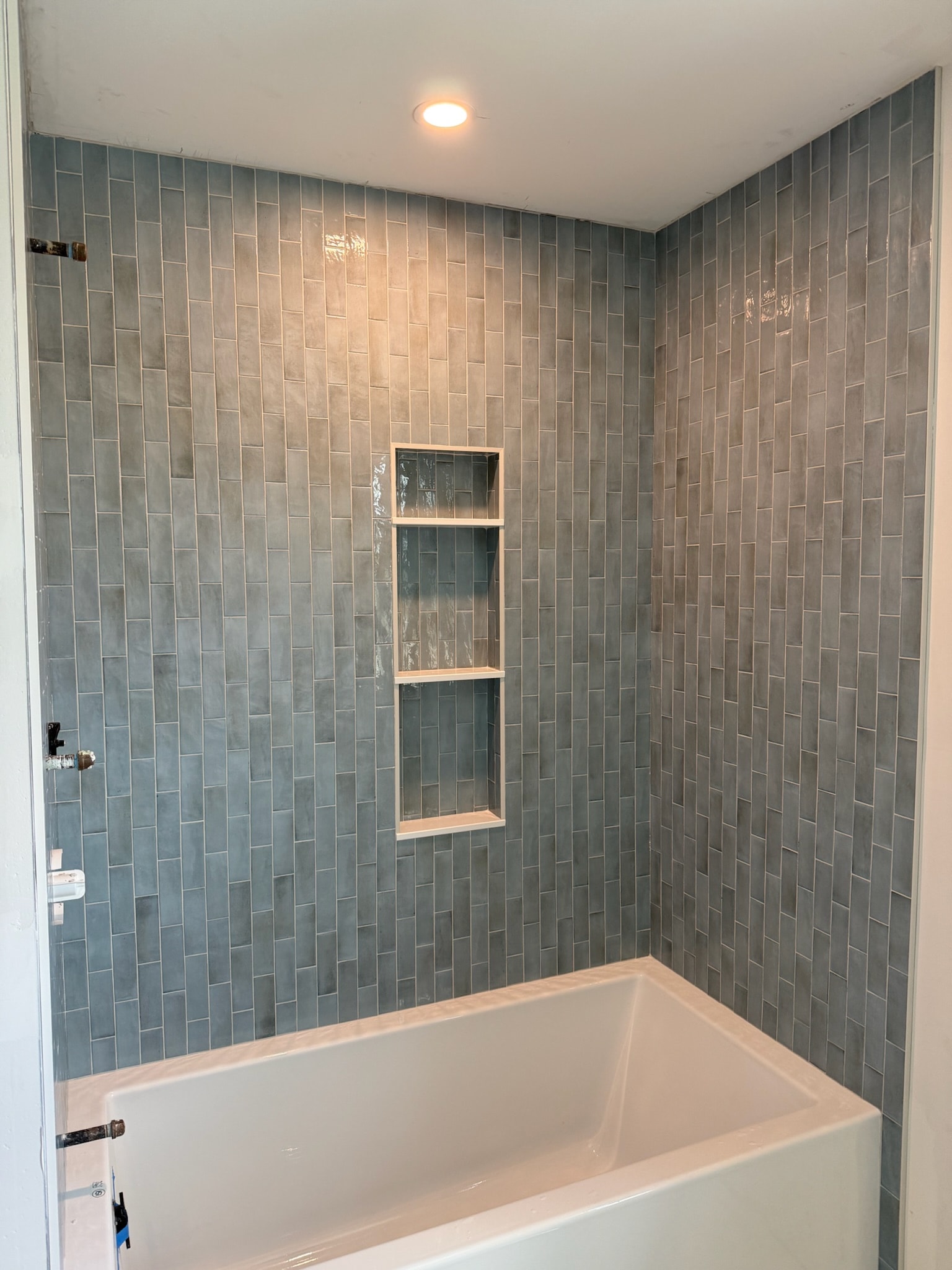 Shower tile with mosaic floor