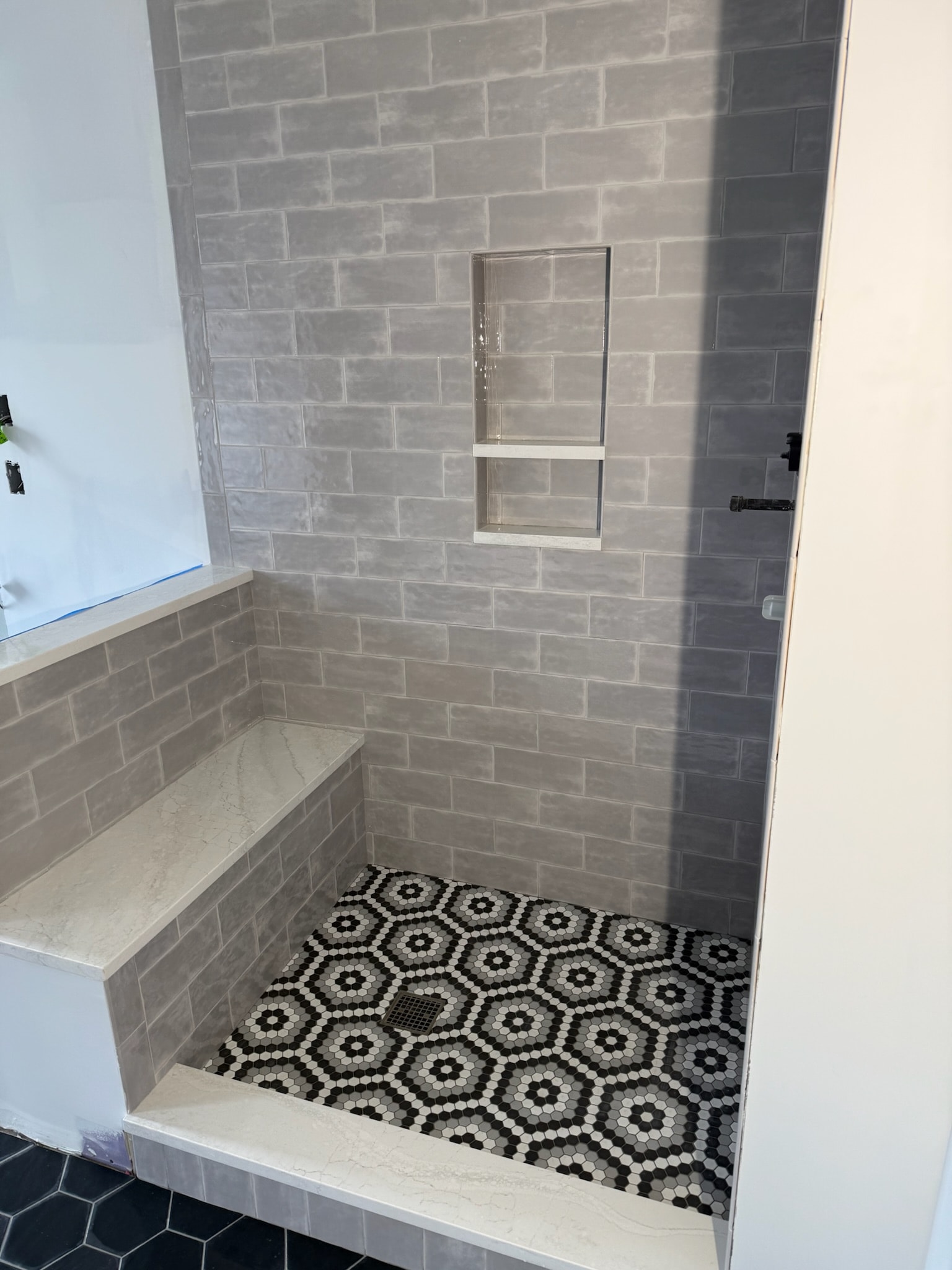 Large-format tile shower